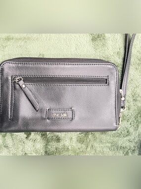 The Sak Black Leather Wristlet Clutch with Front Zip Pocket